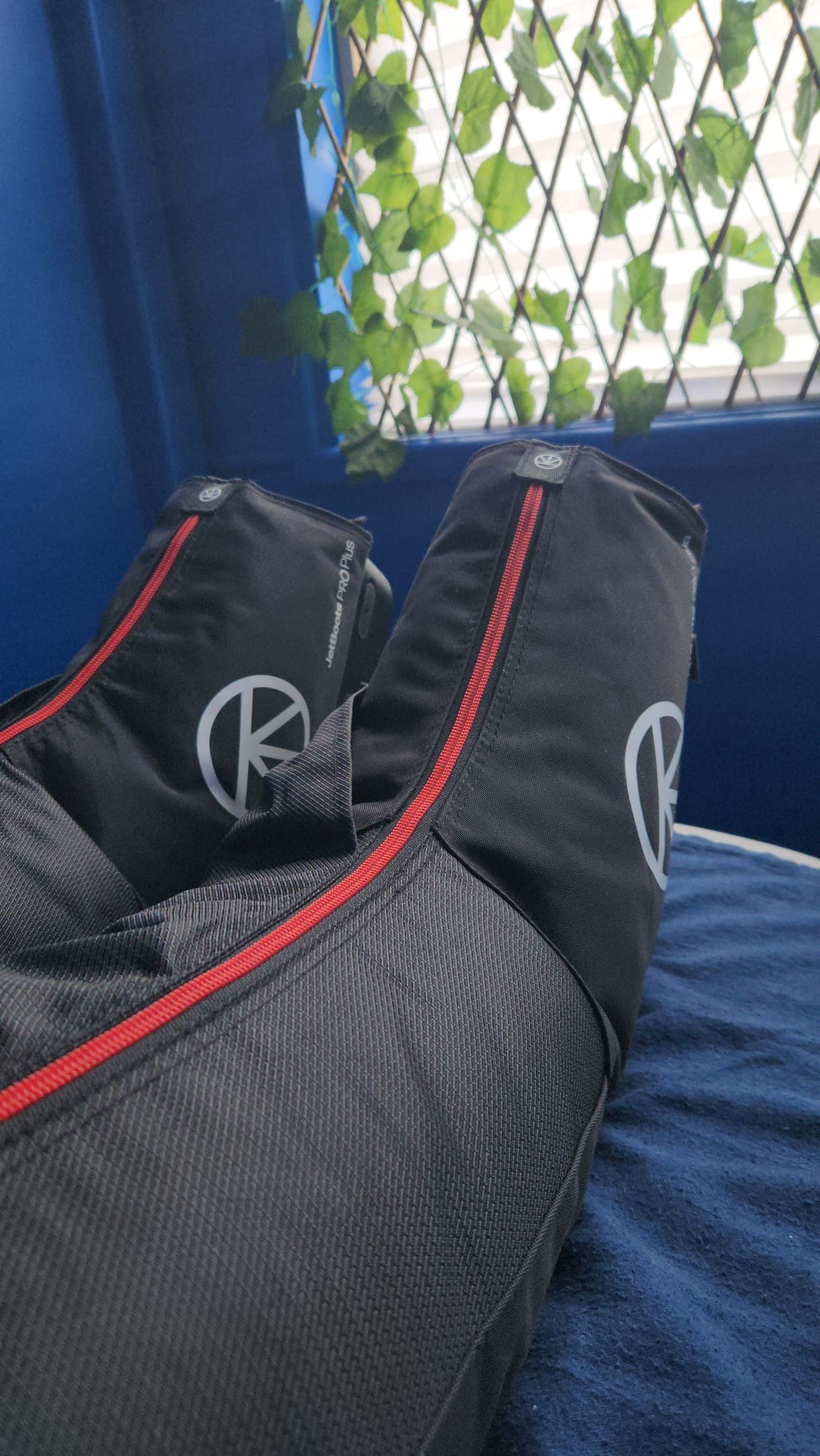 Close-up of the JetBoots Pro Plus compression boot cuffs and branding